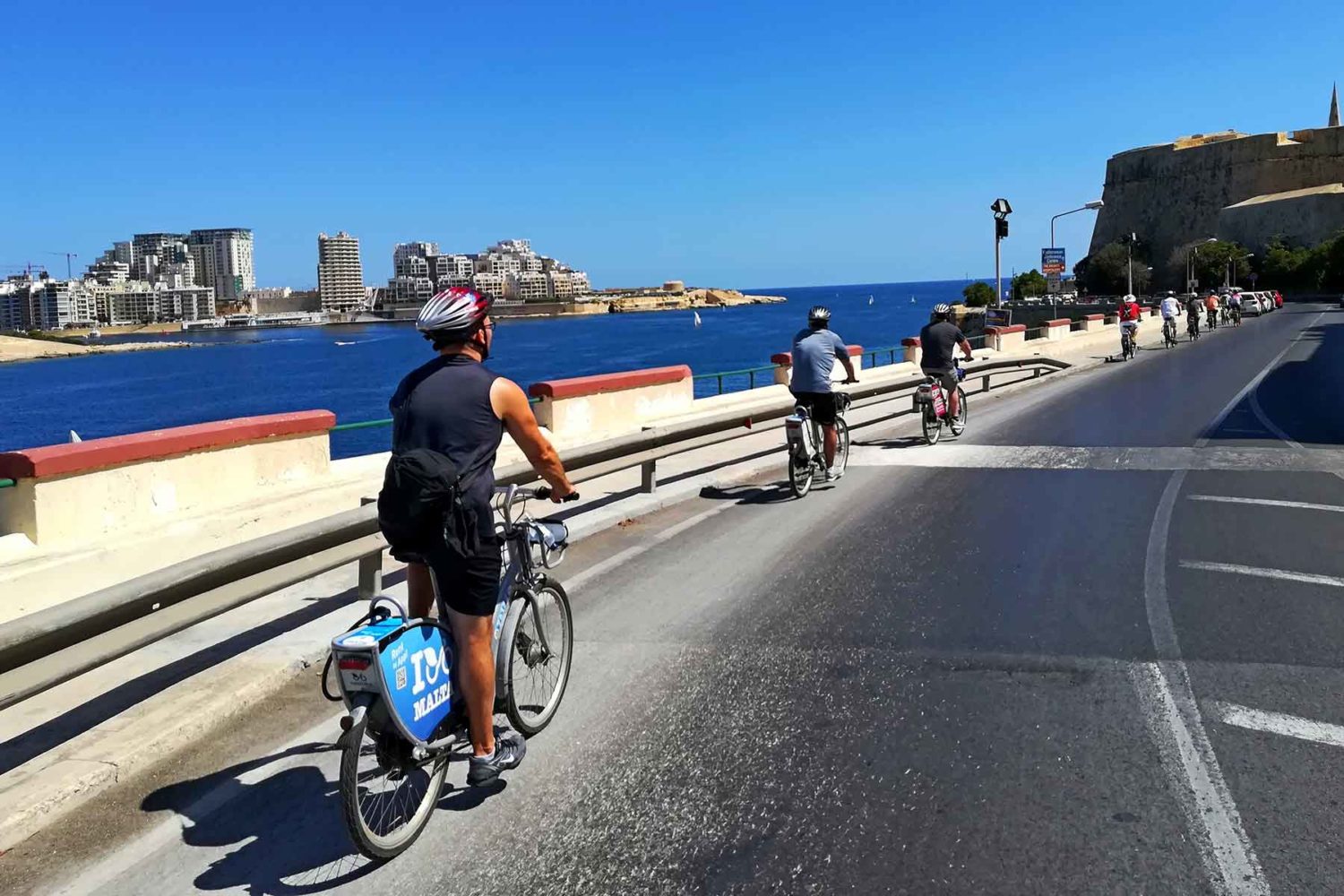 bikers along the sea