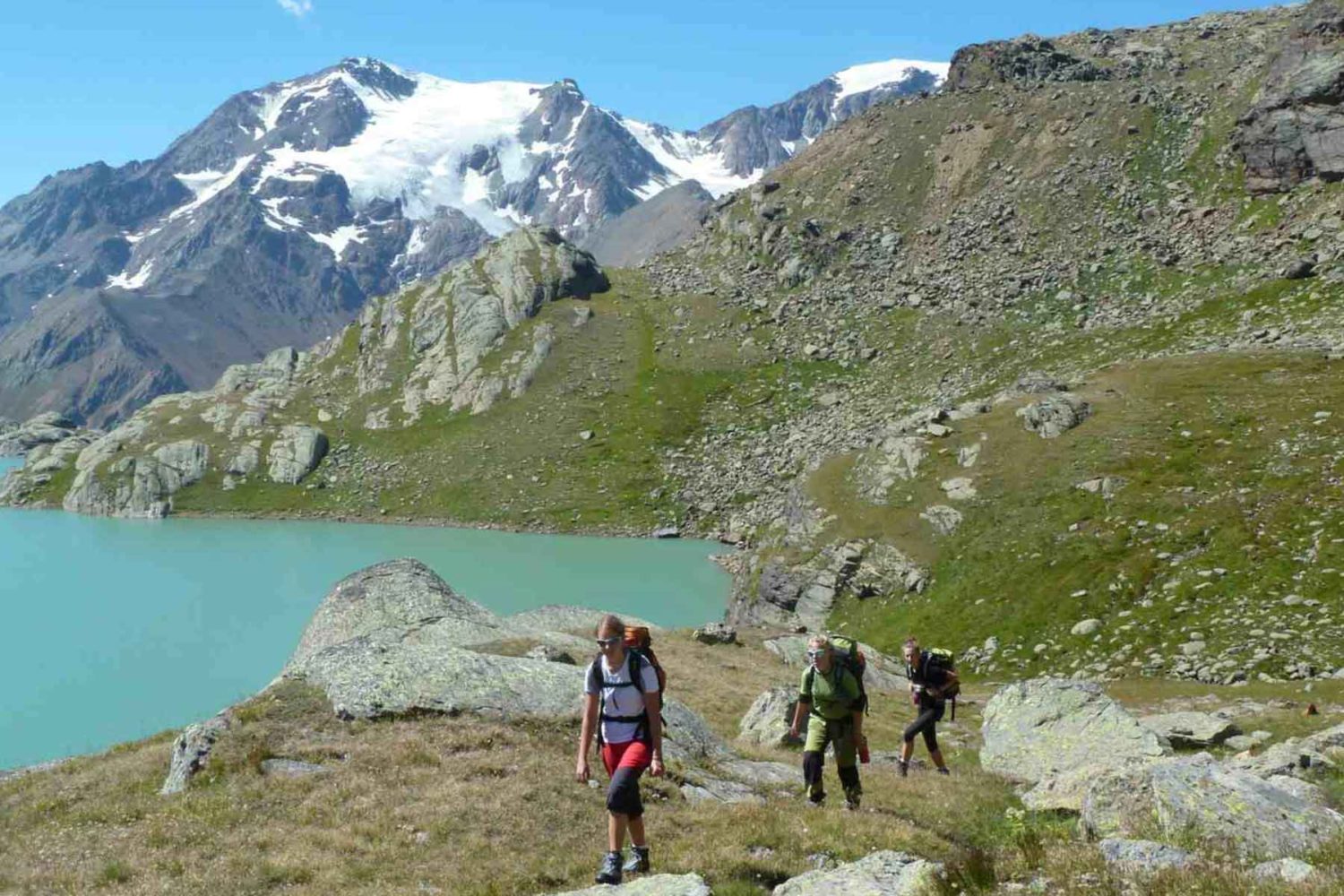 hikers enjoying Stevio Natioal Park- Trekking Holiday in dolomites