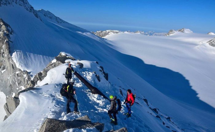 skiers dring the trip in Brenta glacier-skitour in the Dolomites