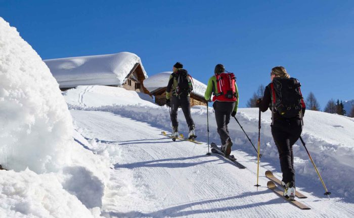 skiers on tour-skitour in the Dolomites