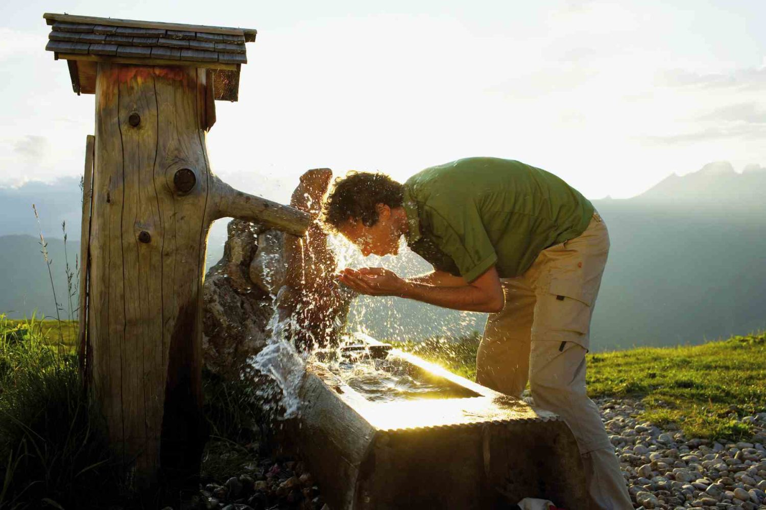 hiker drinking during walking holidays in Austria